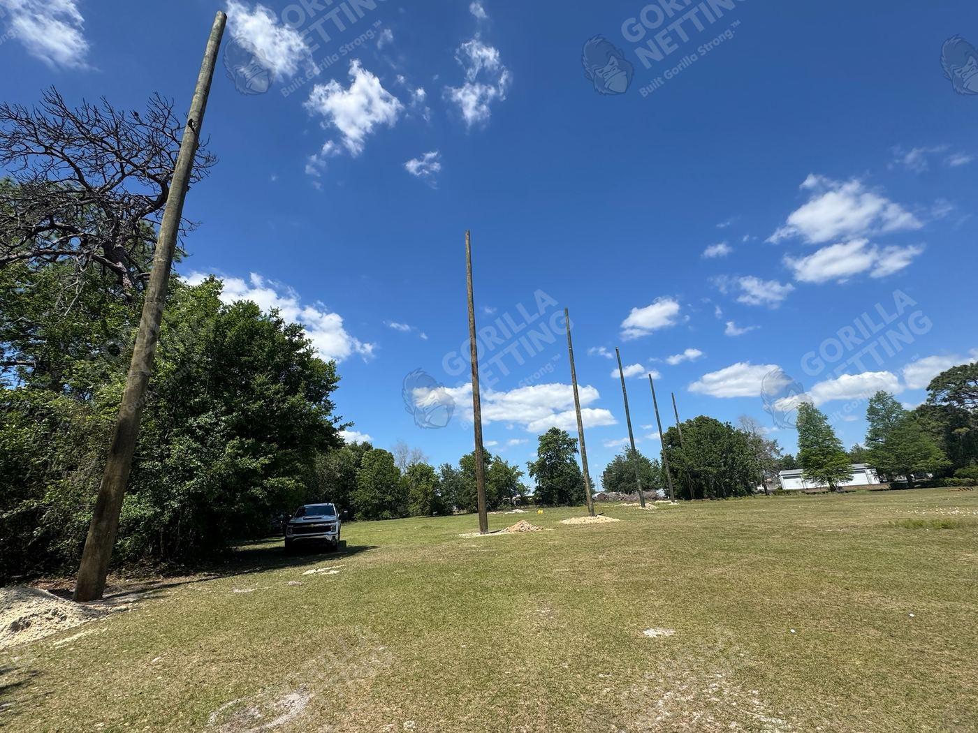 Large-Scale Driving Range Netting System for Green Chasers