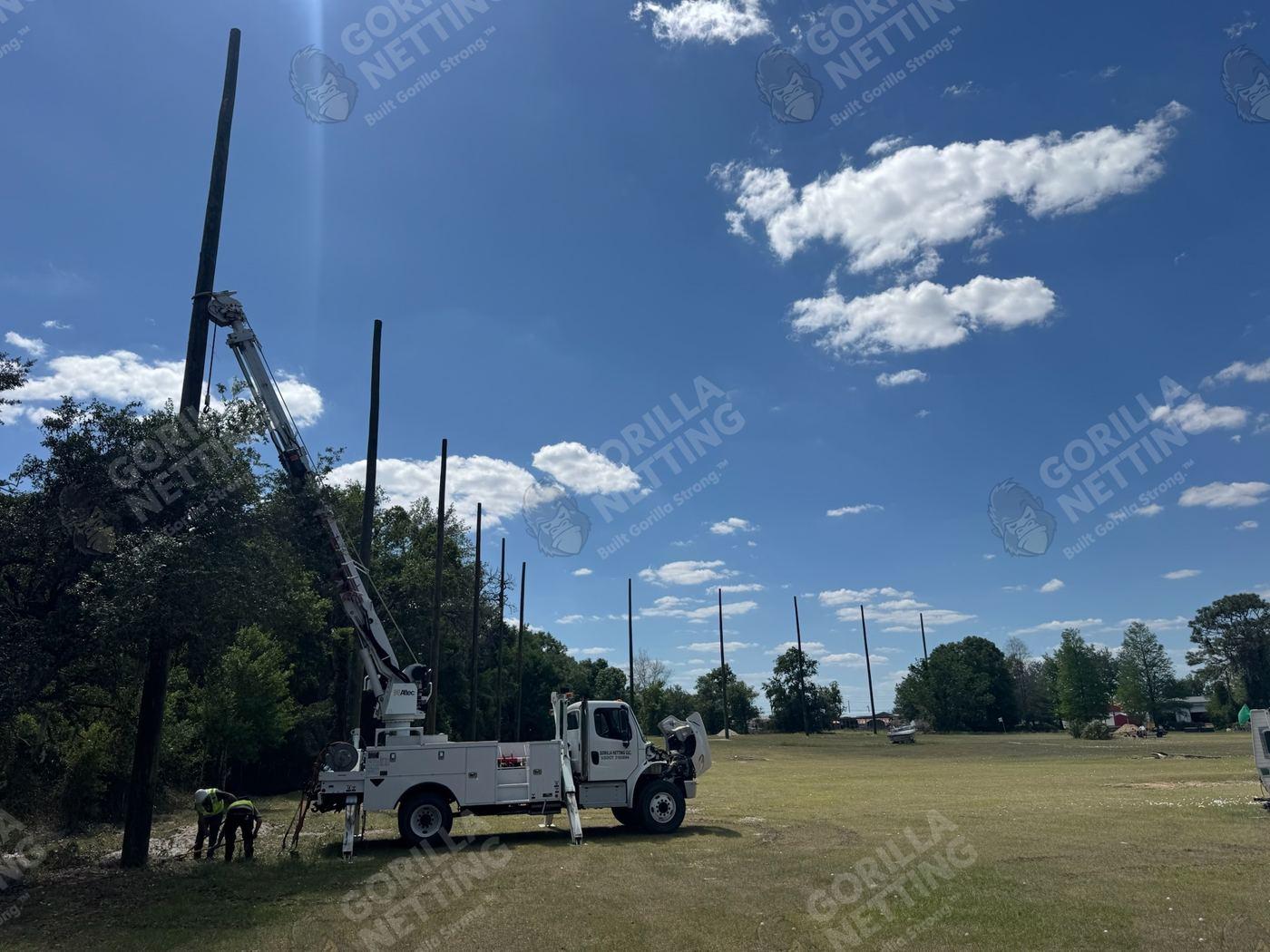 Large-Scale Driving Range Netting System for Green Chasers