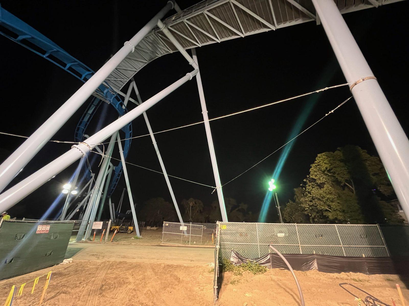 During: Wire rope rigging strung between coaster support columns before the net goes up. Overhead Netting at Busch Gardens Tampa Bay