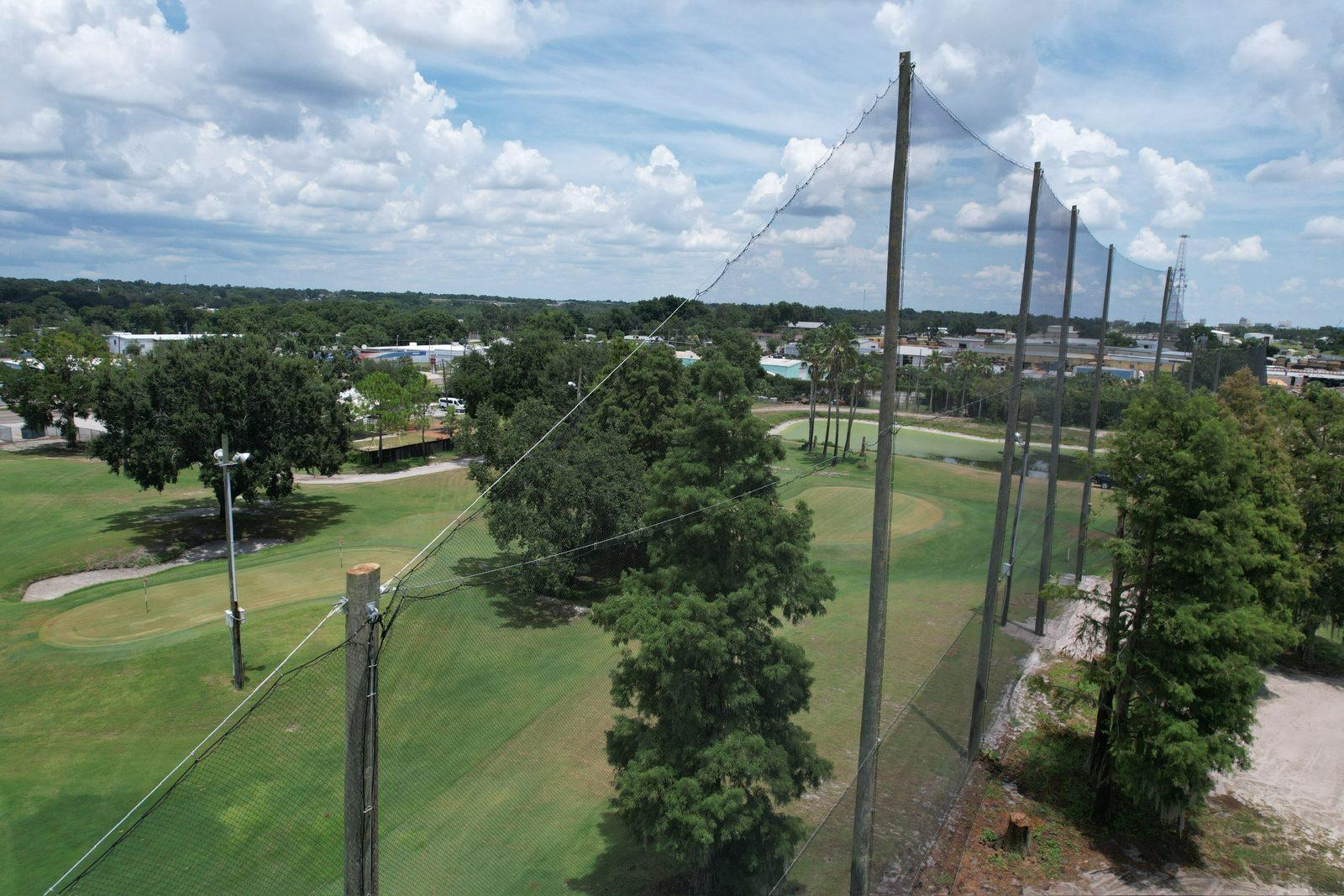 Before: Old netting at the tee, filled with debris clumps. Perimeter Netting Replacement at the YMCA Par 3 Course in Lakeland