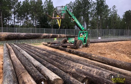 Gorilla Netting Equipment Operator Preparing Poles for Installation