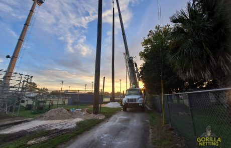 Pole Installation for Baseball Perimeter Netting System