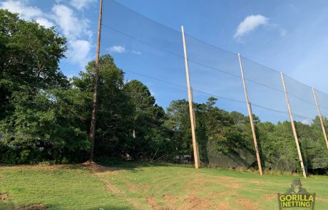 Installing Golf range barrier netting at the first tee of Atlanta