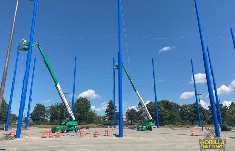 Crew Installs Hardware at Netted Drone Enclosure Installation at University at Buffalo, by Gorilla Netting
